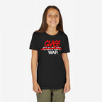 A young girl smiles in a Class War Shirt featuring bold, graffiti-style text altering Culture War to CLASS WAR, embodying a message of activism and resistance. She pairs it with olive-green pants.