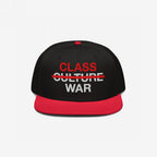 Class War Hat featuring bold embroidery: “CLASS” in red, “CULTURE” crossed out, and “WAR” in white. A statement piece advocating for economic justice and unity, challenging systemic oppression.