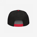 Class War Hat featuring a black snap-back style with red adjustable strap and top button, symbolizing economic justice and unity by highlighting the focus on class struggle over political distractions.