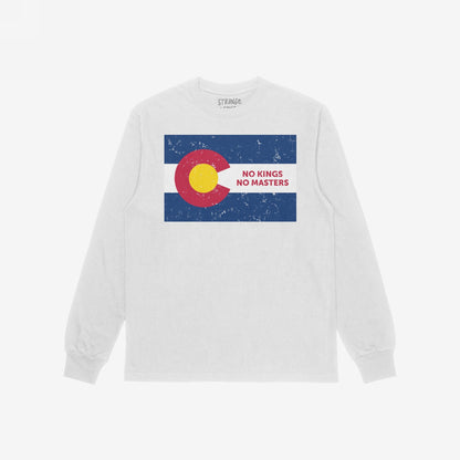 Light-colored, long-sleeve T-shirt featuring a distressed Colorado state flag print and the slogan “NO KINGS NO MASTERS,” embodying rebellion and autonomy. Part of the Colorado No Kings Flag Shirt collection.