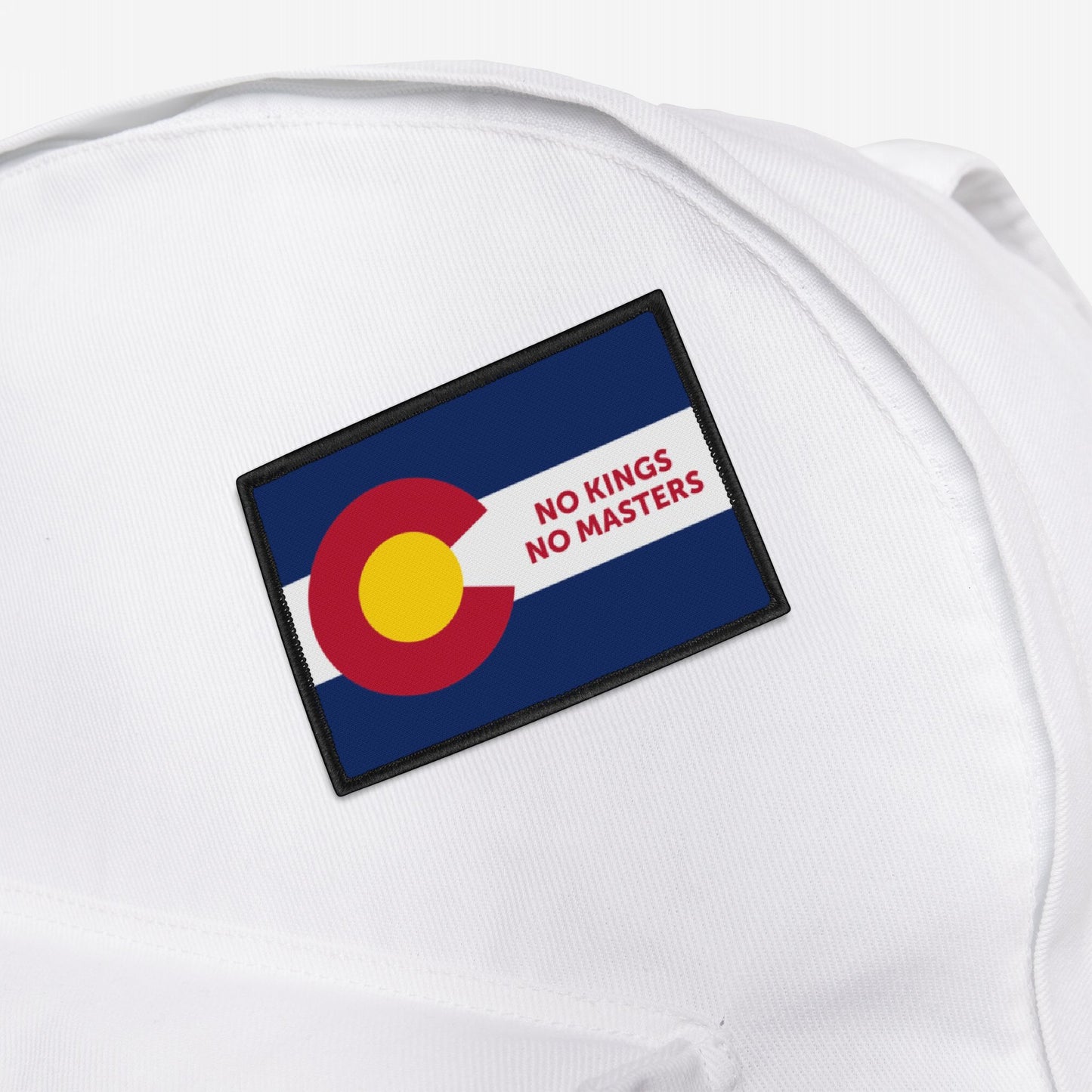 Colorado Flag No Kings Patch on a white fabric background, featuring the Colorado state flag design with NO KINGS NO MASTERS in red, symbolizing self-governance and empowerment.
