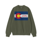 Plain-green long-sleeve sweatshirt featuring a distressed Colorado flag with the slogan “NO KINGS NO MASTERS” in red, emb