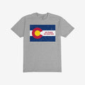 Heather-gray Colorado No Kings Flag Shirt with a distressed C flag graphic and red NO KINGS NO MASTERS text, symbolizing autonomy and rebellion. Supports Colorado Immigrant Rights Coalition.
