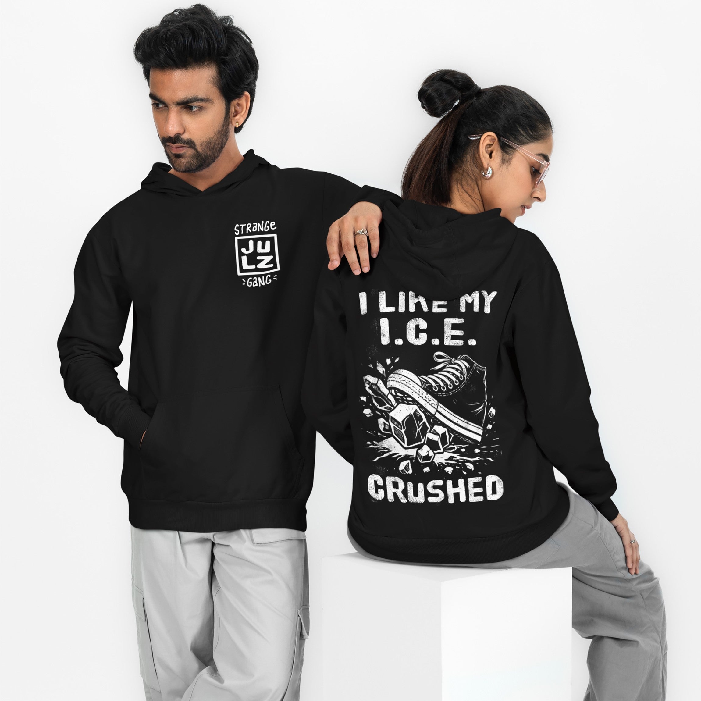 Two models in matching Crushed ICE Hoodie & Sweatshirt; front shows logo, back features sneaker crushing ice graphic with anti-ICE message.