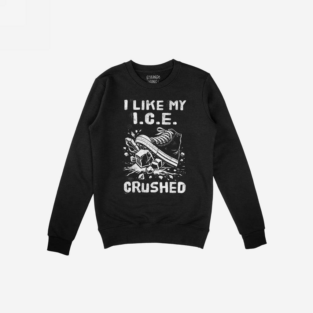 Crushed ICE Hoodie & Sweatshirt features a bold graphic of a sneaker smashing ice cubes, with the slogan “I LIKE MY I.C.E. CRUSHED,” conveying a strong anti-ICE, pro-immigrant rights message.