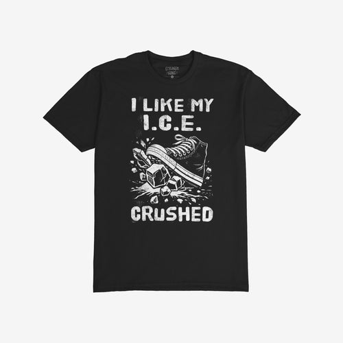 Crushed ICE T-shirt features a sneaker crushing ice cubes with I LIKE MY I.C.E. CRUSHED in bold lettering, symbolizing anti-fascist and pro-immigrant rights activism.