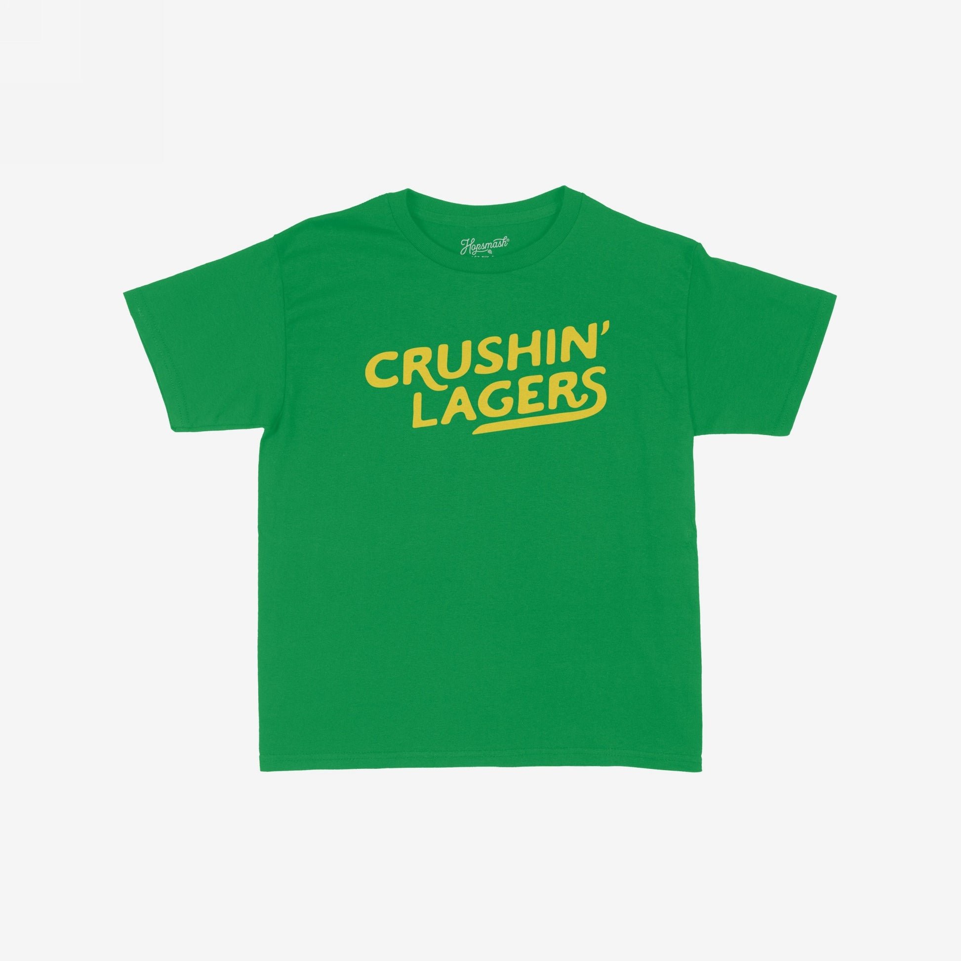 Crushin' Lagers Women's Baby Tee features bold yellow CRUSHIN’ LAGERS text on a green crop top, exuding retro varsity vibes and beer energy, perfect for casual outings.