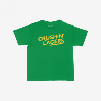 Crushin' Lagers Women's Baby Tee features bold yellow CRUSHIN’ LAGERS text on a green crop top, exuding retro varsity vibes and beer energy, perfect for casual outings.