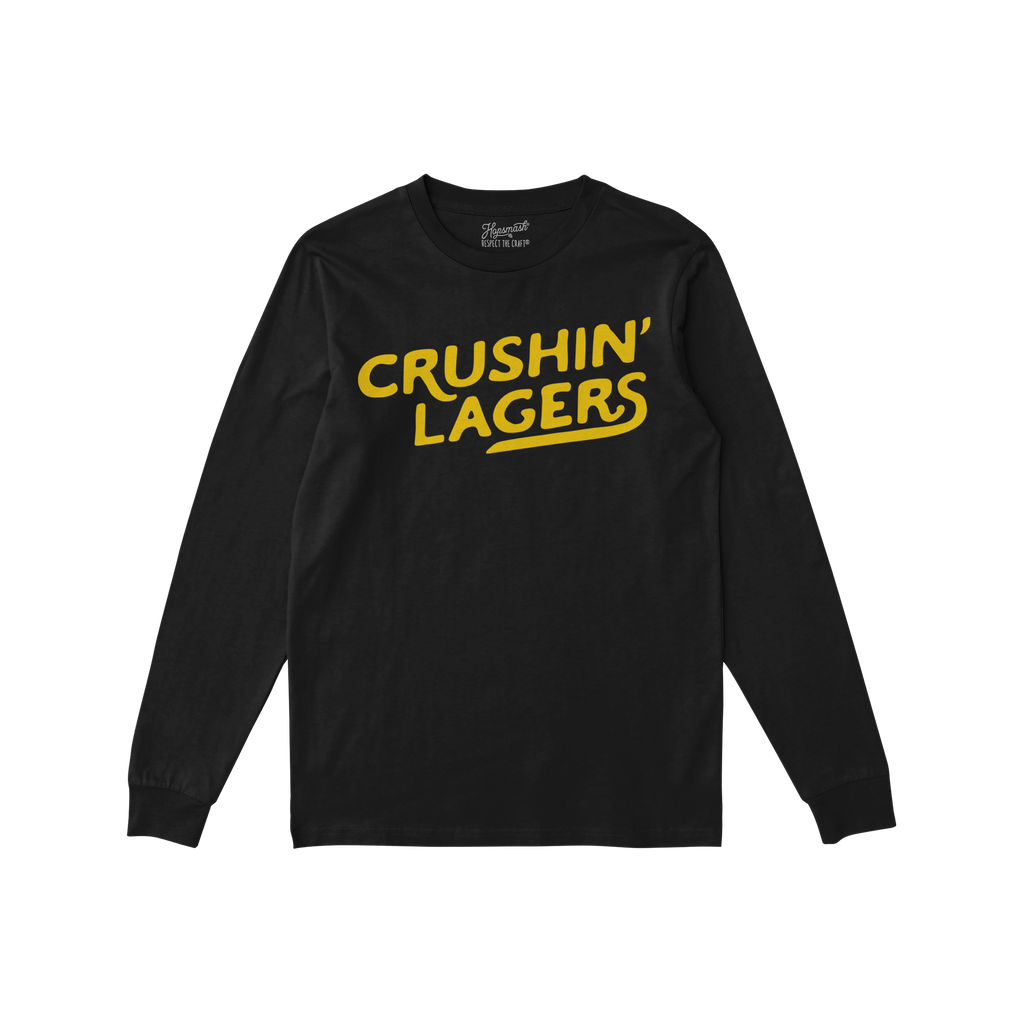 Black long-sleeve Crushin' Lagers T-shirt featuring bold yellow script on the chest, embodying a carefree, bold attitude towa