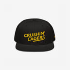 Crushin' Lagers Hat: This black snapback features a bold yellow CRUSHIN' LAGERS embroidery, celebrating lager enthusiasts with a retro twist. Perfect for casual outings and brewery visits, embodying good vibes and inclusivity.