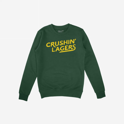 Forest-green crewneck sweatshirt with bold yellow “CRUSHIN’ LAGERS” print, embodying a rebellious, carefree attitude. Perfect for casual, comfort-focused beer enthusiasts embracing a laid-back, inclusive lifestyle.