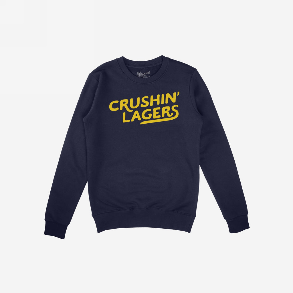 Navy-blue Crushin' Lagers Hoodie & Sweatshirt with bold yellow lettering, embodying a rebellious, pro-beer attitude. Cozy fleece design ideal for relaxed, carefree moments, perfect for bold, expressive comfort.