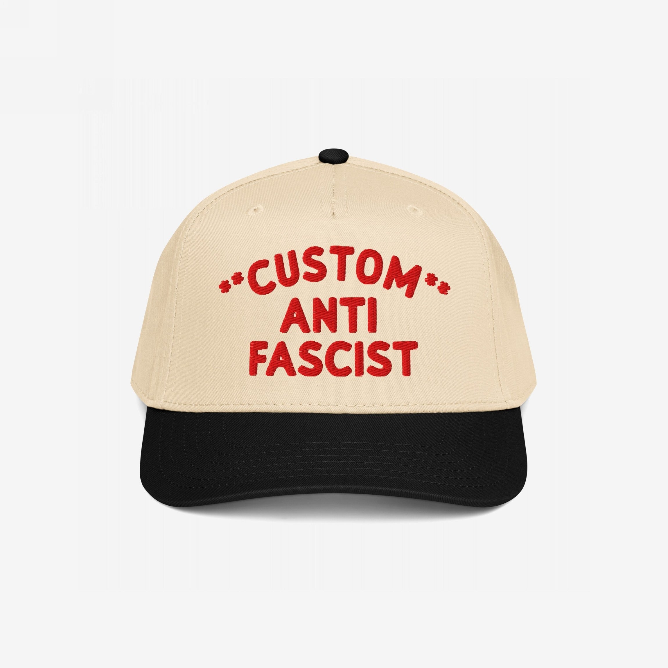 Two-tone cap with a beige crown and black bill, featuring bold red embroidery, CUSTOM ANTI FASCIST, showcasing the Custom Anti-Fascist 5-Panel Hat's structured design, adjustable fit, and activism statement.