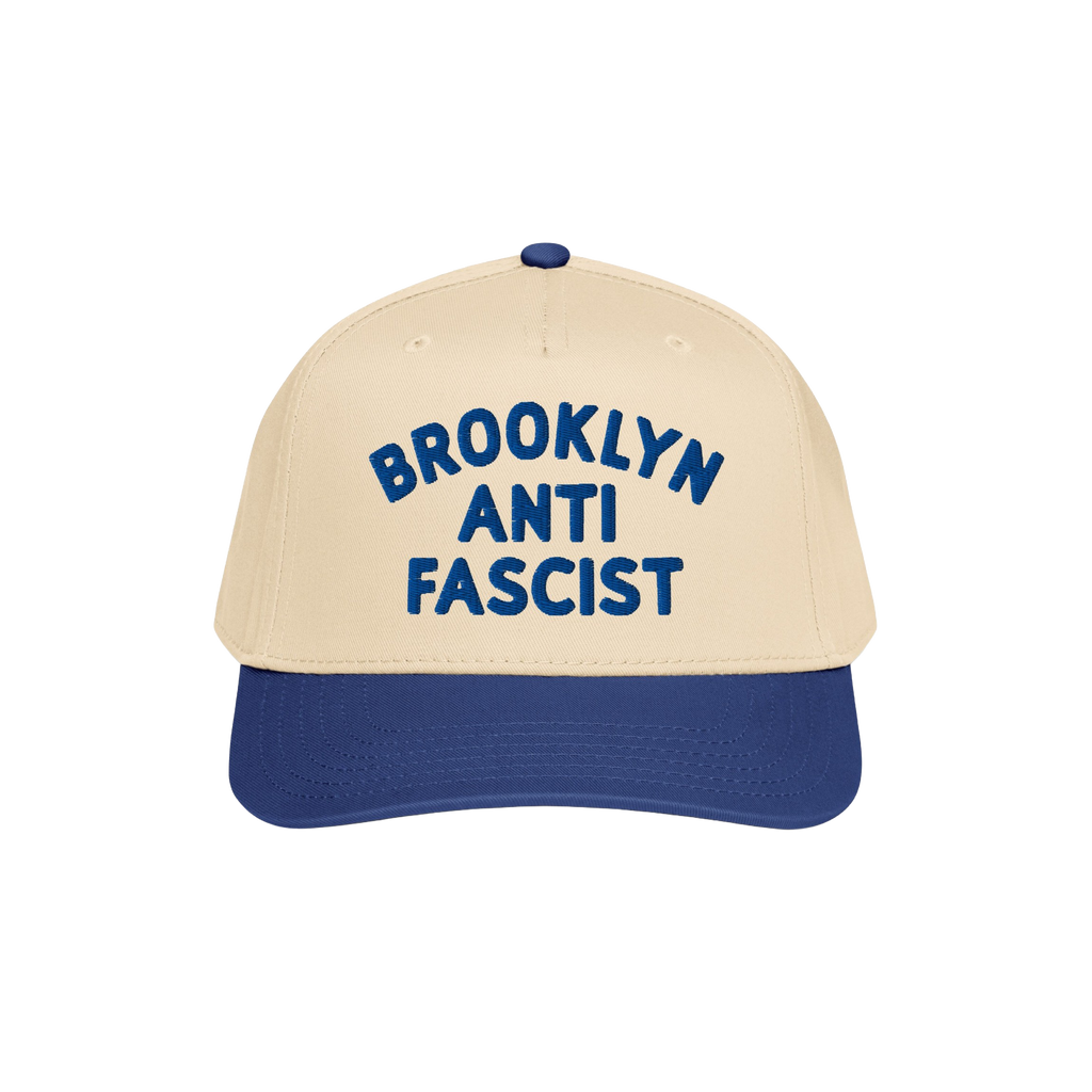 Custom Anti-Fascist 5-Panel Hat with a beige crown and navy brim features bold blue BROOKLYN ANTI FASCIST embroidery, offerin