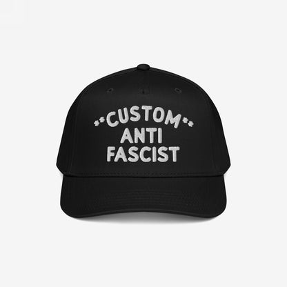 Custom Anti-Fascist 5-Panel Hat featuring white embroidered CUSTOM ANTI FASCIST text on the front. This structured, mid-profile cap with adjustable snapback closure conveys a powerful, personalized message.