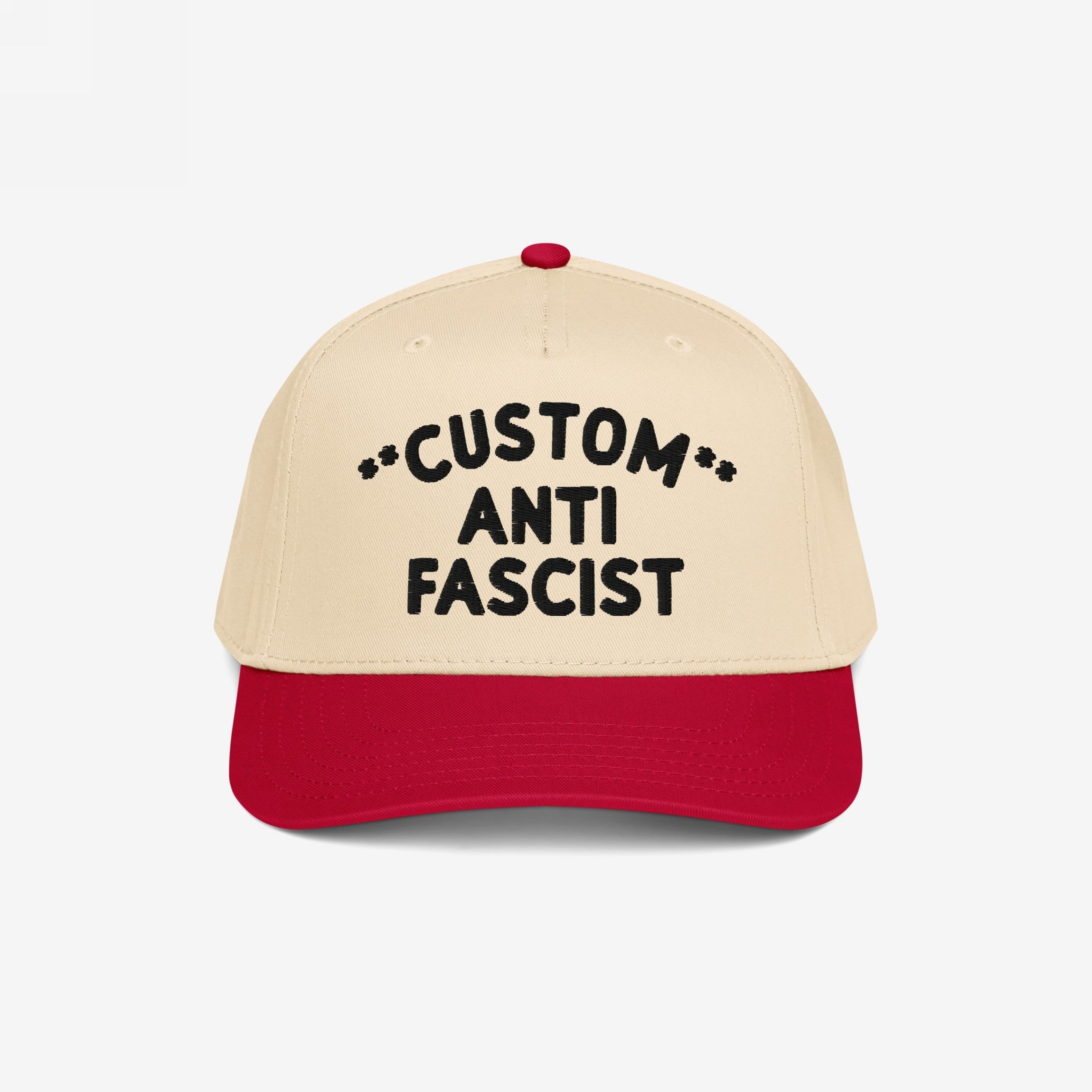 Custom Anti-Fascist 5-Panel Hat with beige crown and red bill, featuring bold black CUSTOM ANTI FASCIST embroidery, symbolizing activism and individuality. Adjustable snapback for comfort.