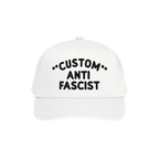 Custom Anti-Fascist 5-Panel Hat features bold black embroidered text on a white cap, blending activism with style. Ideal for 