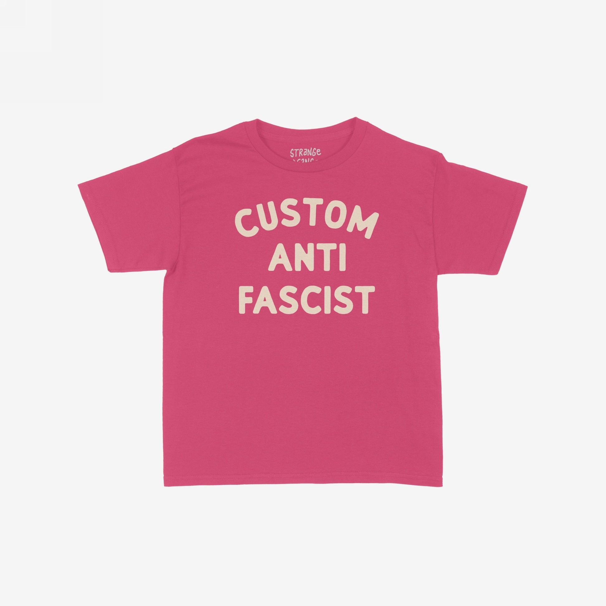 Custom Anti-Fascist Women's Baby Tee featuring bold cream text on a pink background, perfect for expressing personal activism with a customizable touch. Ideal for those who embrace bold, retro-inspired fashion statements.