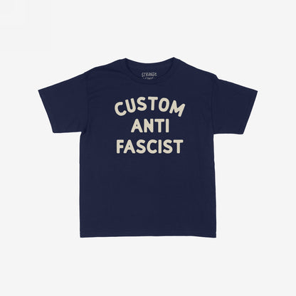Custom Anti-Fascist Women's Baby Tee featuring CUSTOM ANTI FASCIST in off-white block letters on a navy-blue tee, offering a retro Y2K style perfect for expressing bold activism.