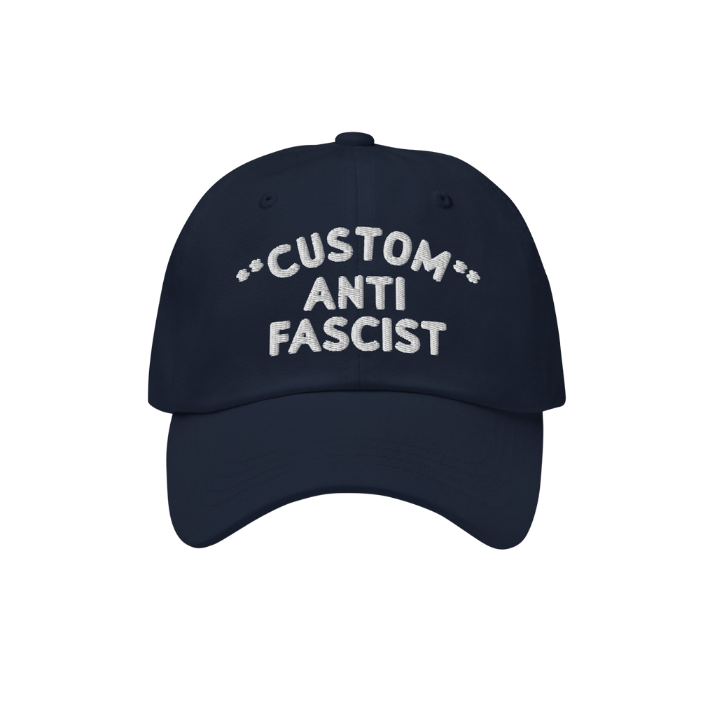 Custom Anti-Fascist Dad Hat featuring a navy-blue design with white embroidered text. This unstructured, low-profile cap has 