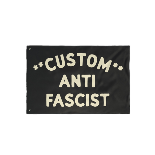 Custom Anti-Fascist Flag featuring bold, cream hand-drawn lettering with Custom arched above ANTI FASCIST and starburst symbo
