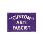 Custom Anti-Fascist Flag with hand-lettered text CUSTOM ANTI FASCIST and star-like asterisks. Features two grommets for hangi