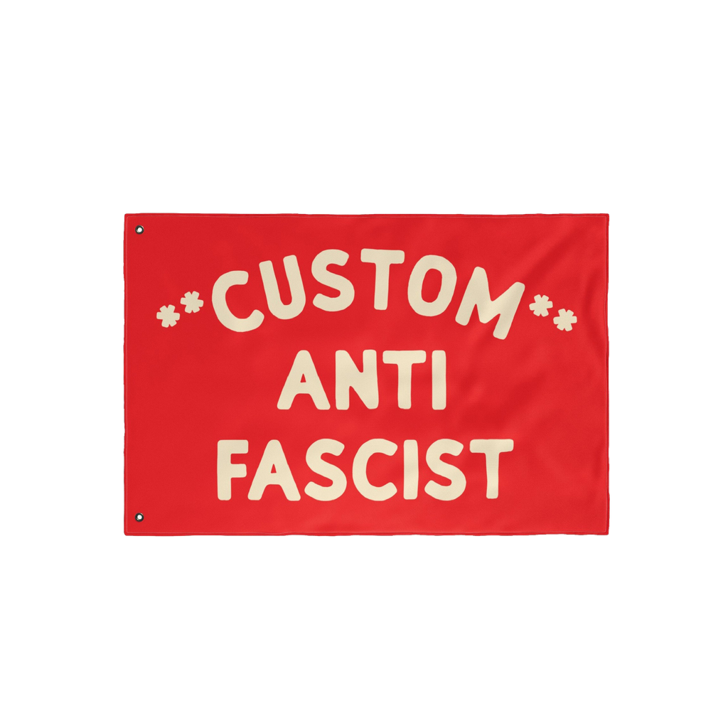 Custom Anti-Fascist Flag featuring bold off-white letters on a red background, with grommets for hanging. Personalize the Cus