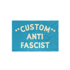 Custom Anti-Fascist Flag featuring bold, cream lettering on a bright-blue background with metal grommets for easy display, pe