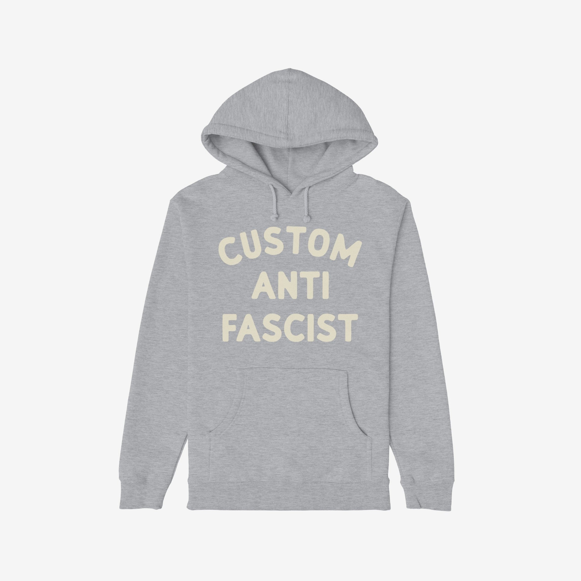 Custom Anti-Fascist Hoodie featuring bold cream text on a light-gray pullover with front kangaroo pocket, designed for personalization and active expression of values against fascism, adding comfort and activism to your wardrobe.