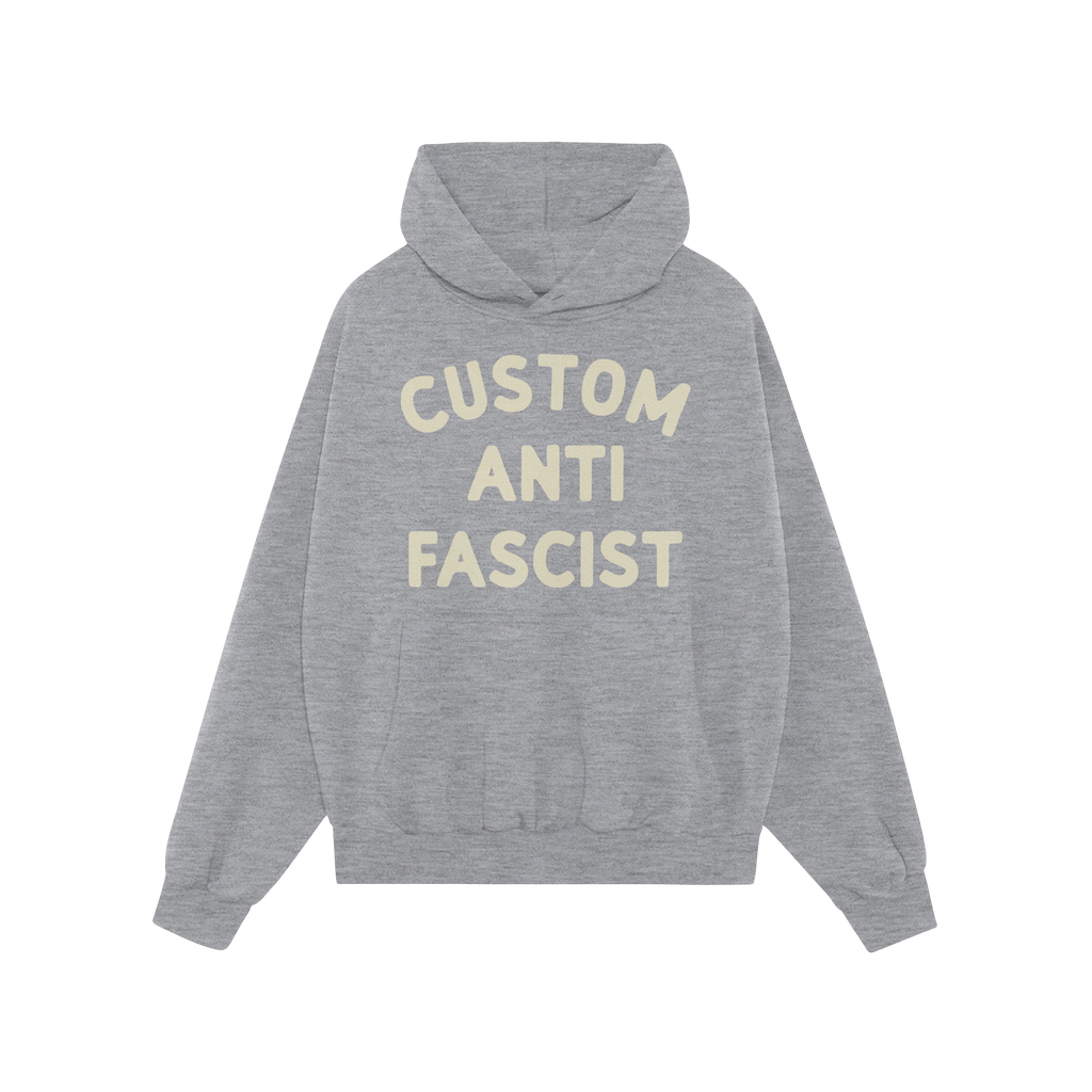 Custom Anti-Fascist Hoodie featuring bold cream text on a light-gray pullover with front kangaroo pocket, designed for person