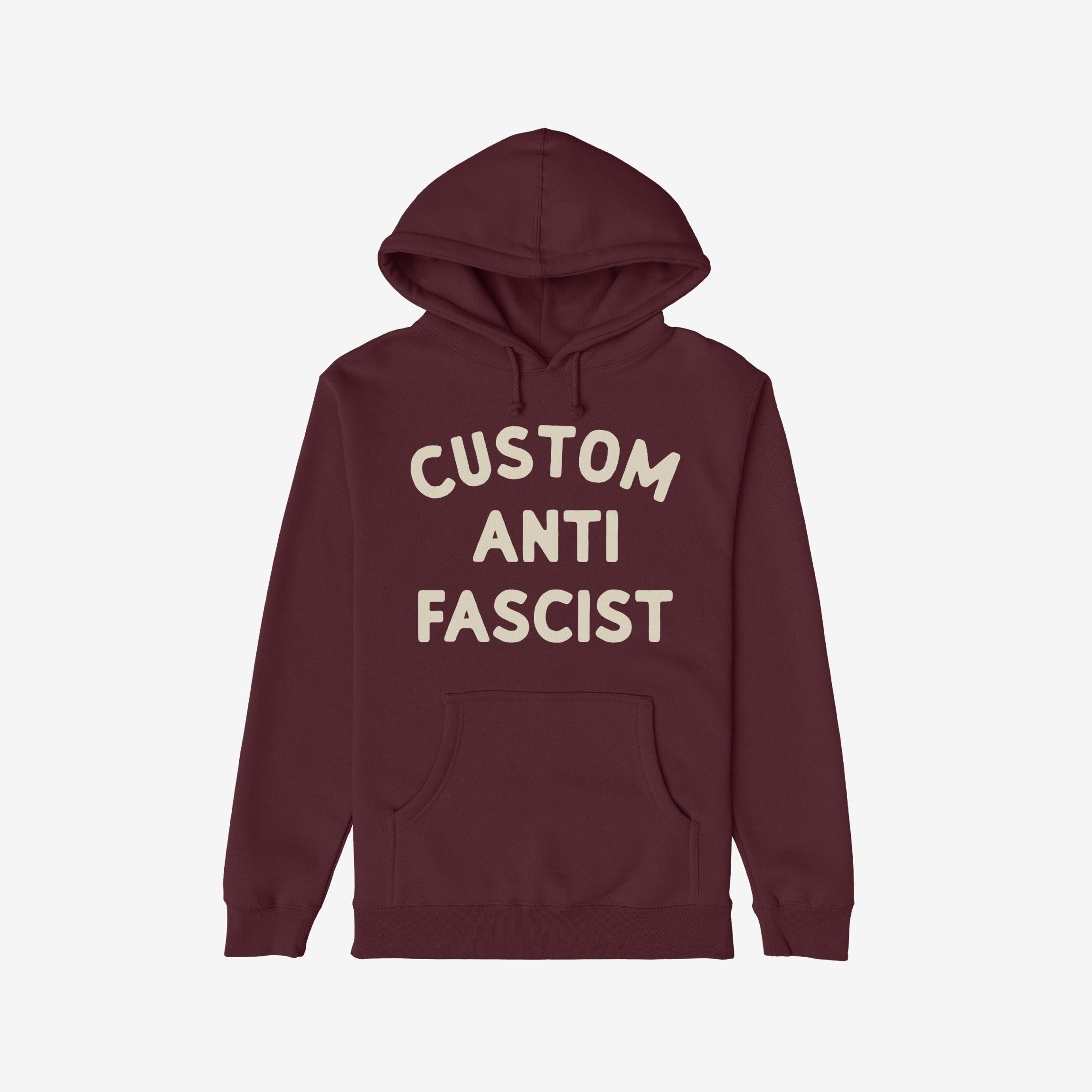 Custom Anti-Fascist Hoodie featuring an off-white Custom Anti Fascist block text on a maroon pullover with a kangaroo pocket and drawstring hood, embodying activism and personal expression.