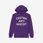 Custom Anti-Fascist Hoodie with CUSTOM ANTI FASCIST in cream ink on the front, featuring a kangaroo pocket and drawstring hood, ideal for those expressing activist values through clothing.