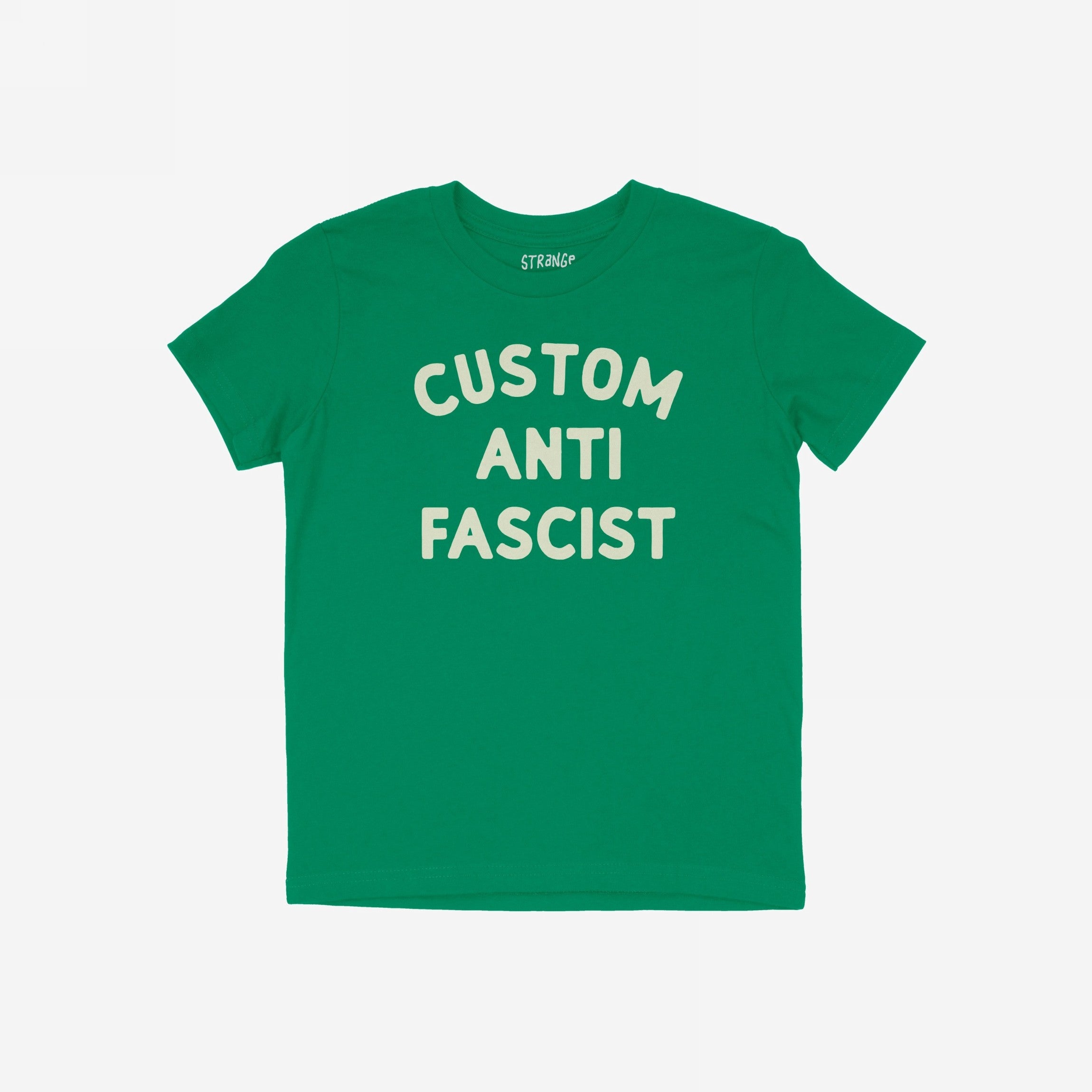 Custom Anti-Fascist Kids T-shirt featuring bold “CUSTOM ANTI FASCIST” text on the front, designed for young activists. The shirt label reads STRANGE.”, embodying the store's commitment to equality and activism.