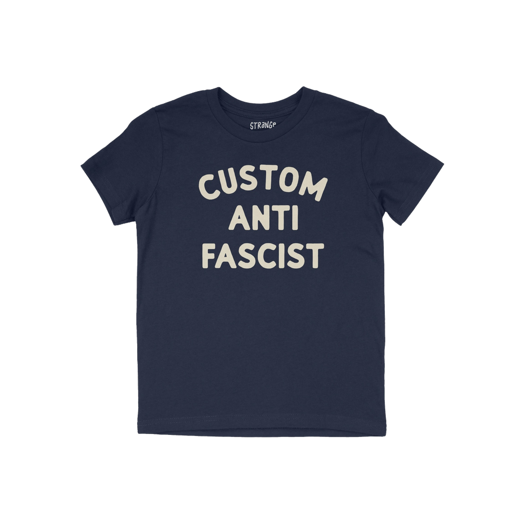 Custom Anti-Fascist Kids T-shirt featuring bold, off-white block letters reading “CUSTOM ANTI FASCIST” on the front, desi