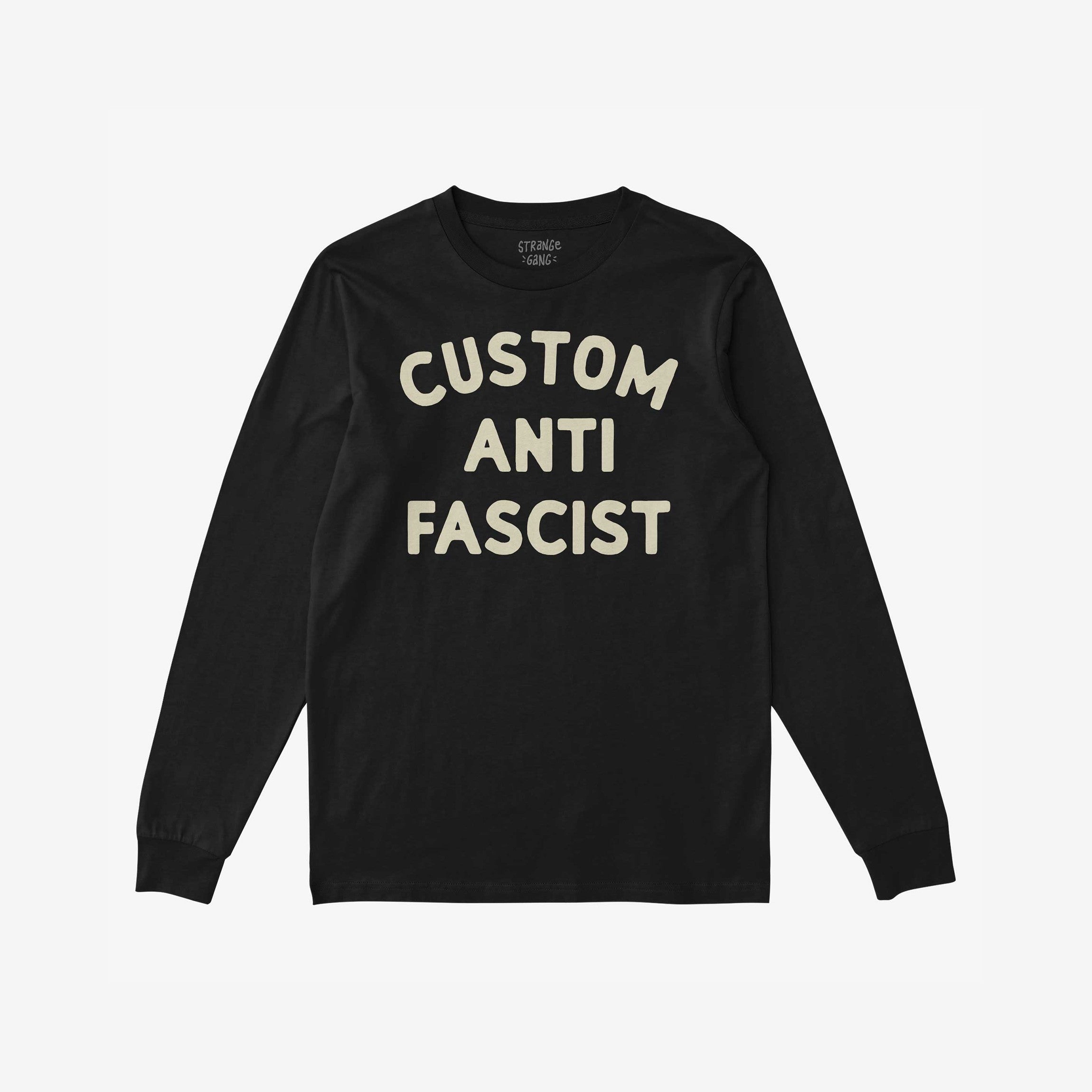 Custom Anti-Fascist Long Sleeve T-shirt with “CUSTOM ANTI FASCIST” in cream block font, ideal for activism. Personalize with your chosen word. Perfect for cooler days, protests, or daily wear.
