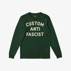 Custom Anti-Fascist Long Sleeve T-shirt featuring “CUSTOM ANTI FASCIST” in cream letters on the chest, designed for activism and personalization. Perfect for expressing individuality and standing up for beliefs.