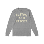 Heather-gray long-sleeve T-shirt with CUSTOM ANTI FASCIST in cream block letters, allowing customization of Custom. Ideal for