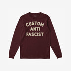 Custom Anti-Fascist Long Sleeve T-shirt featuring bold cream block letters on the front. The shirt offers personalization options for the Custom text, reflecting your community or values.