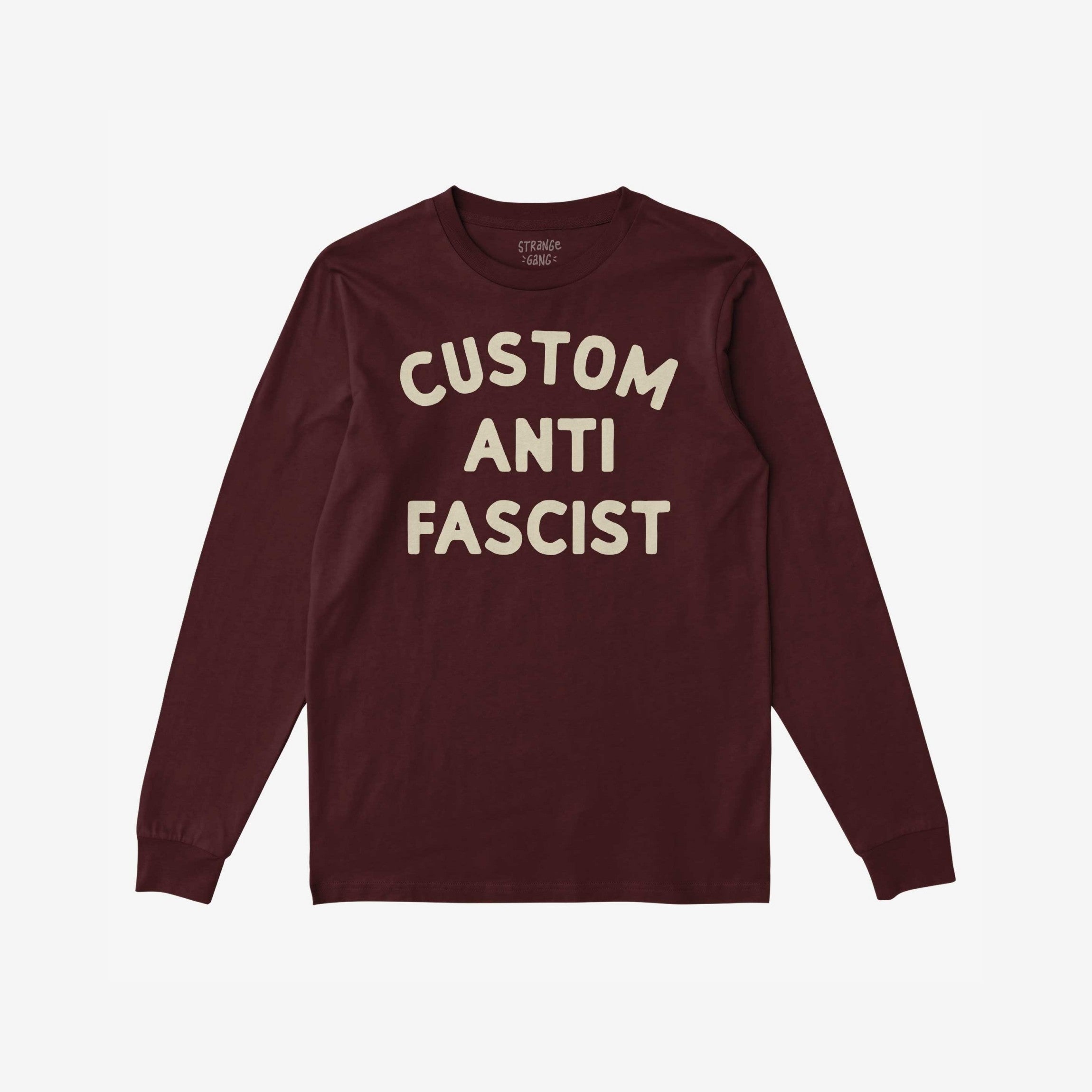 Custom Anti-Fascist Long Sleeve T-shirt featuring bold cream block letters on the front. The shirt offers personalization options for the Custom text, reflecting your community or values.