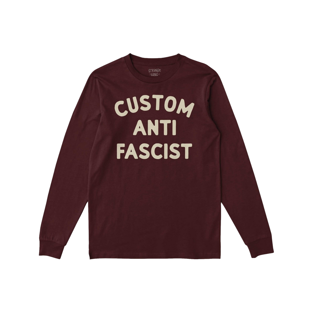 Custom Anti-Fascist Long Sleeve T-shirt featuring bold cream block letters on the front. The shirt offers personalization opt