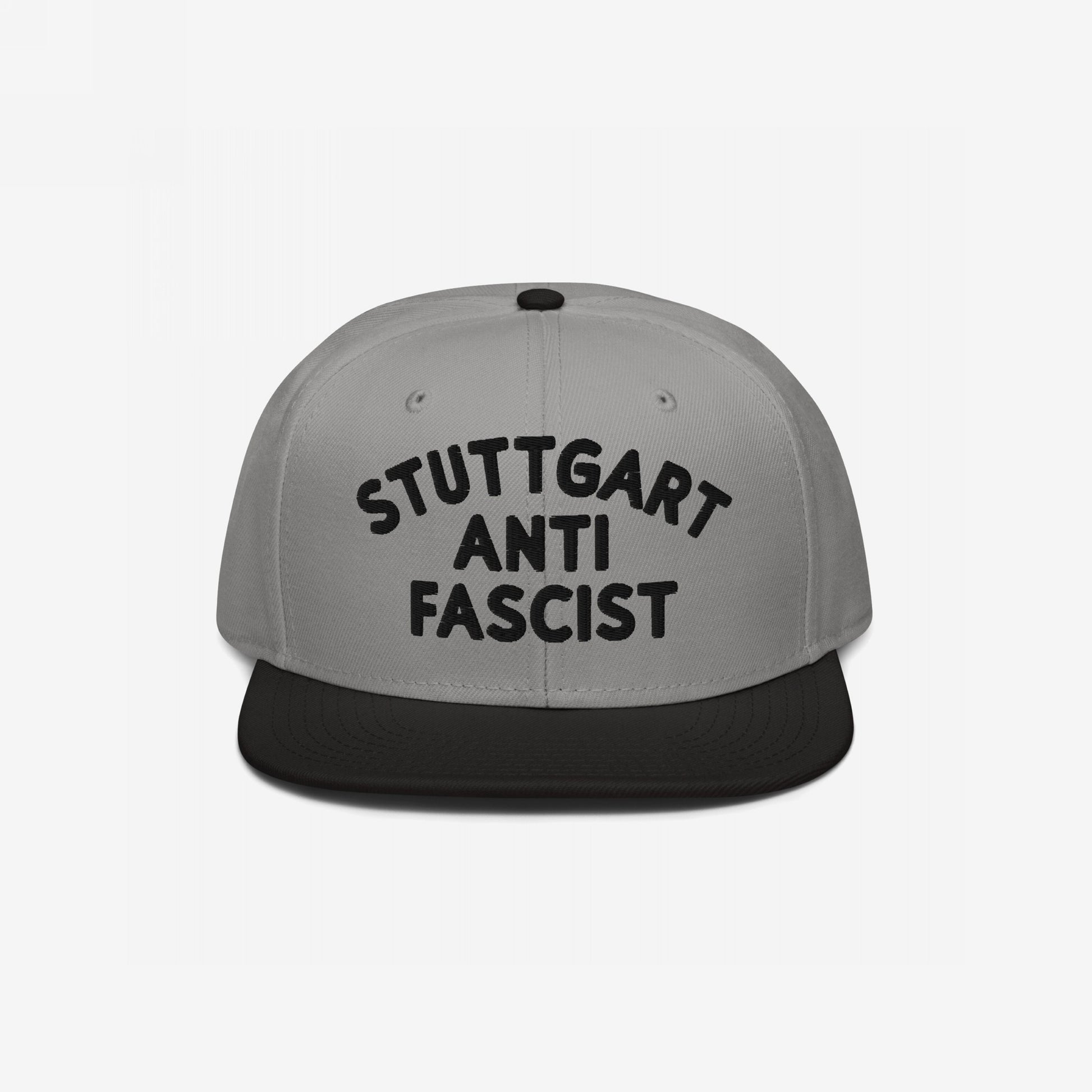 Custom Anti-Fascist Snapback Hat with STUTTGART ANTI FASCIST black embroidery on a two-tone cap, featuring a light gray crown and black brim, designed for a bold, personalized anti-fascist statement.