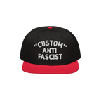 Custom Anti-Fascist Snapback Hat featuring a black crown with red bill and button, highlighted by bold white embroidered text