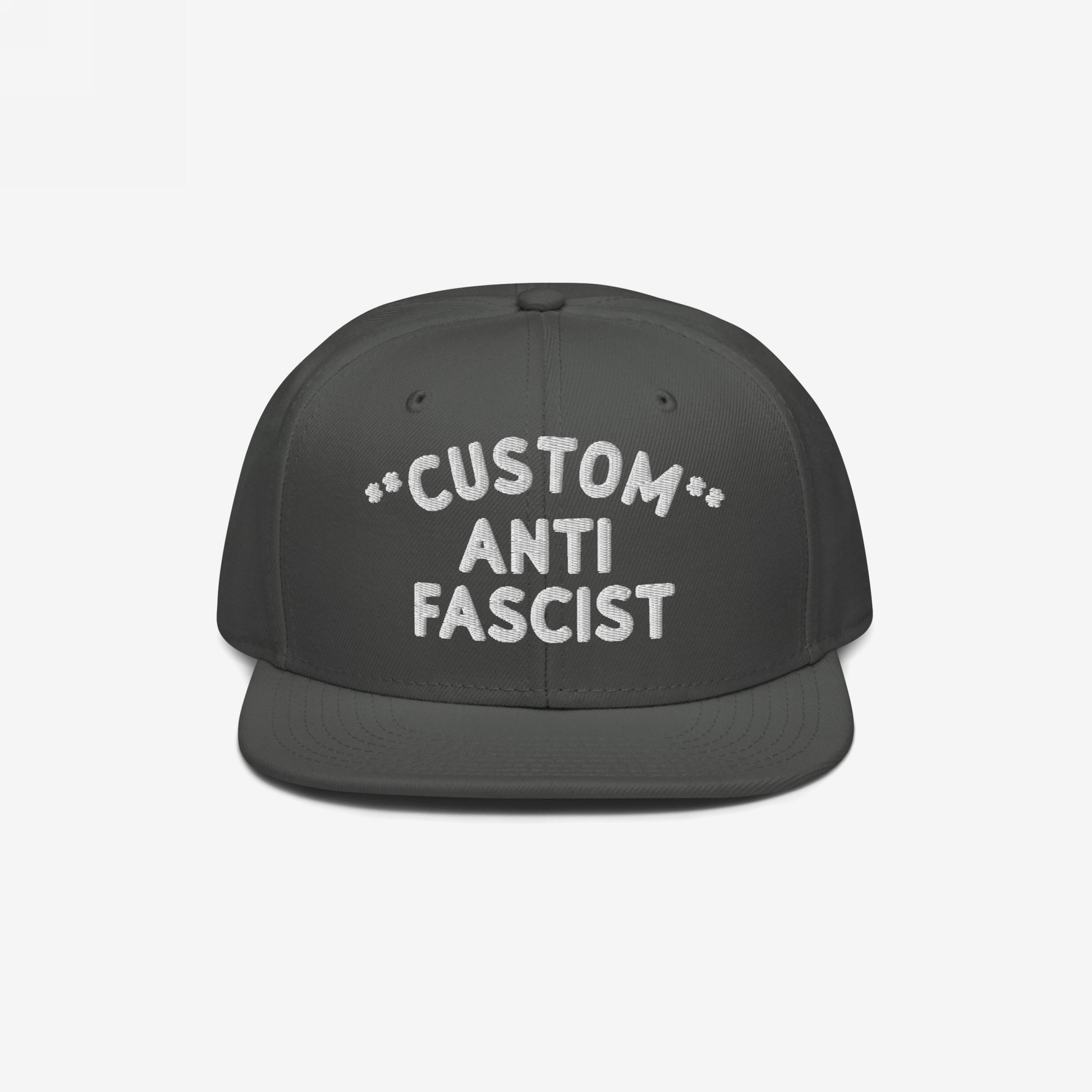 Custom Anti-Fascist Snapback Hat featuring bold white embroidery on a dark flat-brim cap. Show your stance with personalization options, adjustable fit, and a structured design, perfect for making a statement.