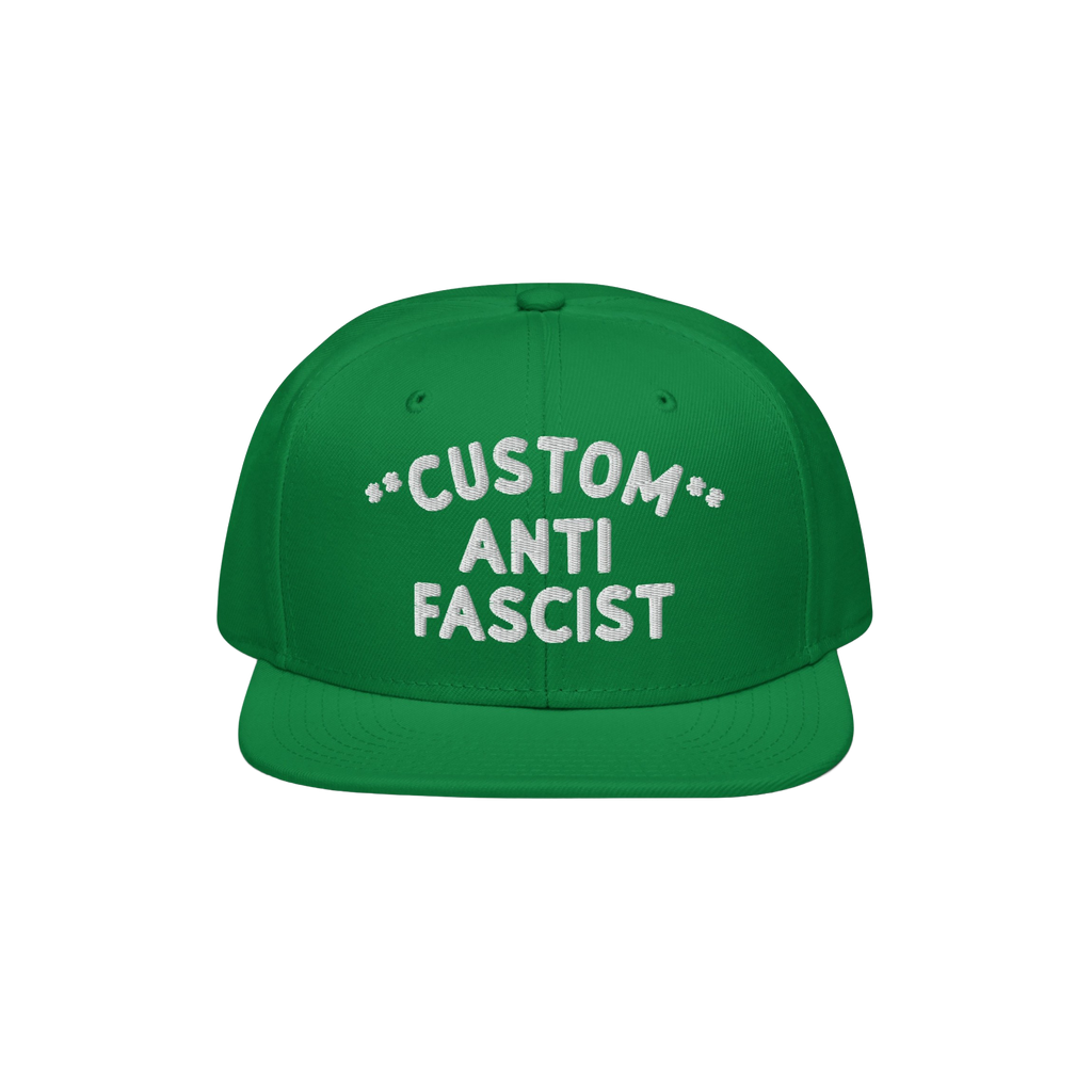 Green flat-bill cap with CUSTOM ANTI FASCIST embroidered in white. The Custom Anti-Fascist Snapback Hat offers personalizatio