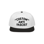 Custom Anti-Fascist Snapback Hat with bold text, featuring a white crown and black visor. Personalize the Custom text for a u