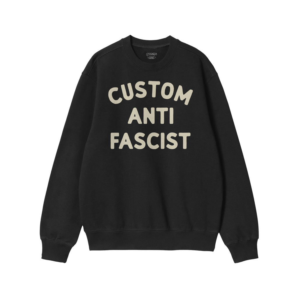 Custom Anti-Fascist Sweatshirt, black crewneck with CUSTOM ANTI FASCIST in off-white. Features ribbed cuffs and hem, ideal fo