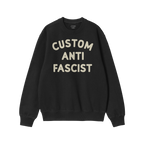 Custom Anti-Fascist Sweatshirt, black crewneck with CUSTOM ANTI FASCIST in off-white. Features ribbed cuffs and hem, ideal fo