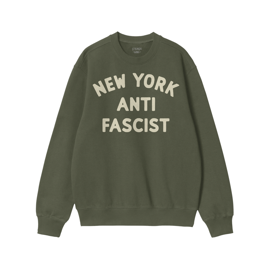 Custom Anti-Fascist Sweatshirt with bold off-white NEW YORK ANTI FASCIST text on dark gray fabric, featuring a small STRANGE 