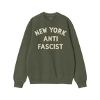 Custom Anti-Fascist Sweatshirt with bold off-white NEW YORK ANTI FASCIST text on dark gray fabric, featuring a small STRANGE 