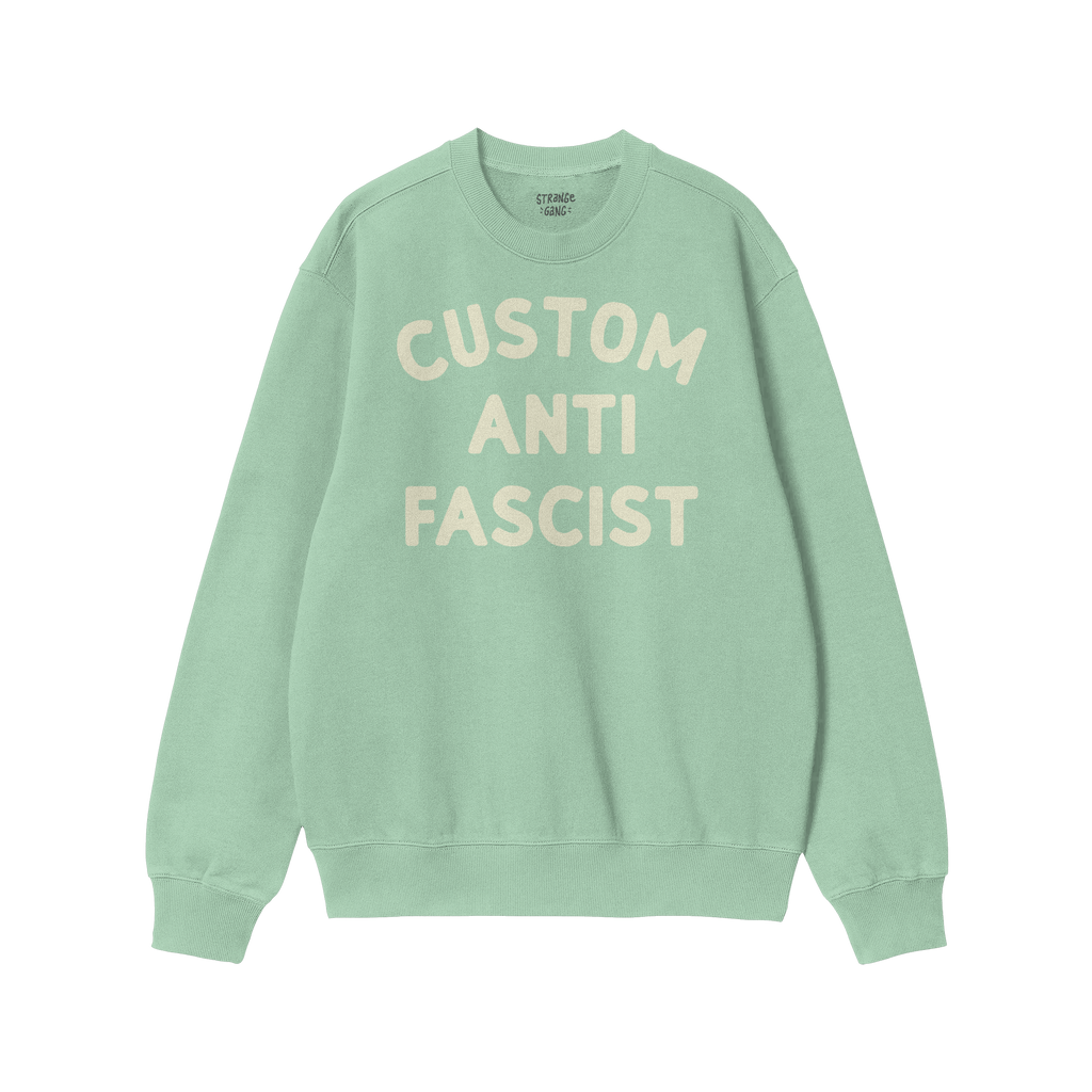 Custom Anti-Fascist Sweatshirt featuring bold, off-white text on a green, long-sleeved crewneck, perfect for expressing anti-
